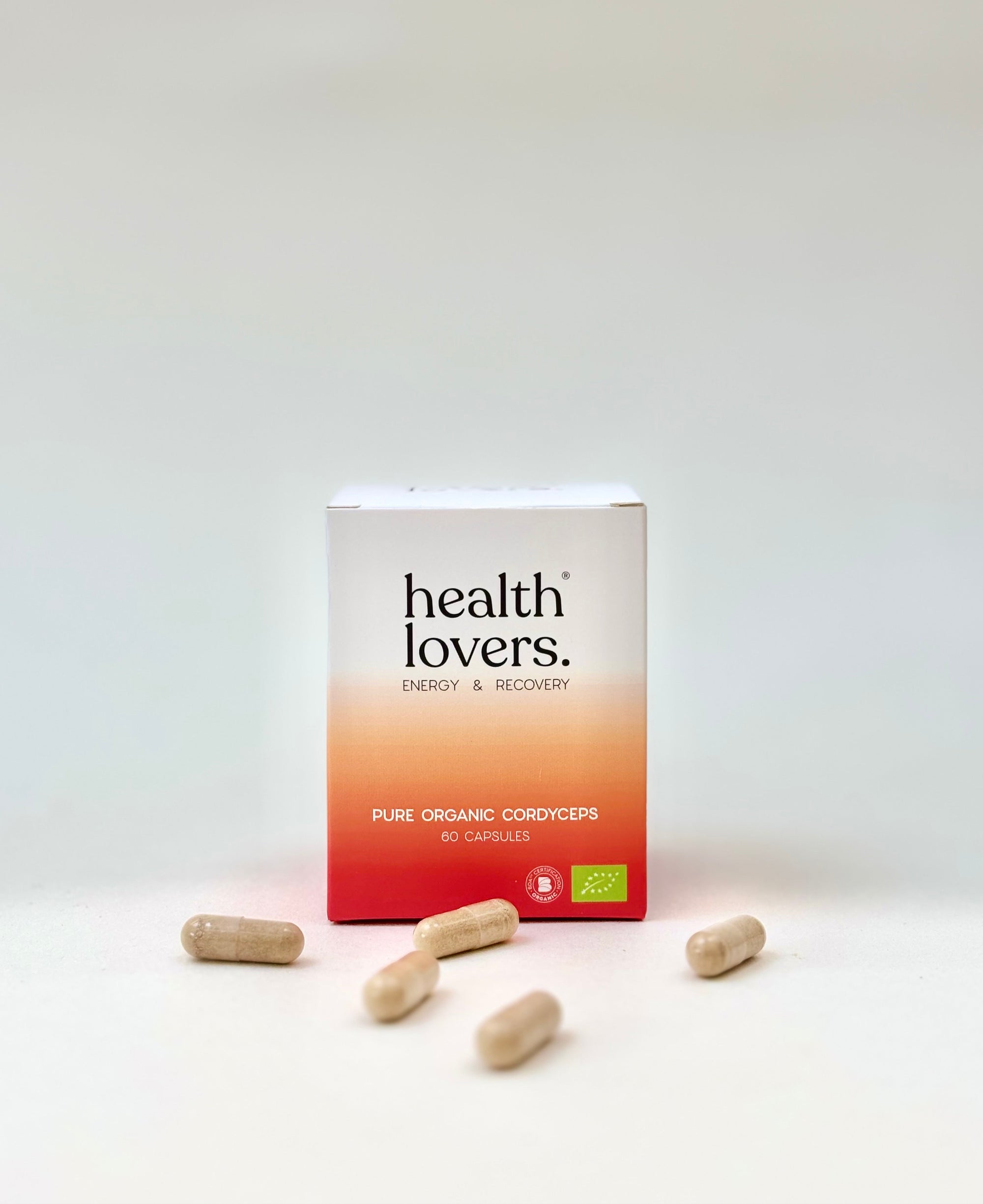 Box of 'health lovers' pure organic cordyceps with capsules on a white background