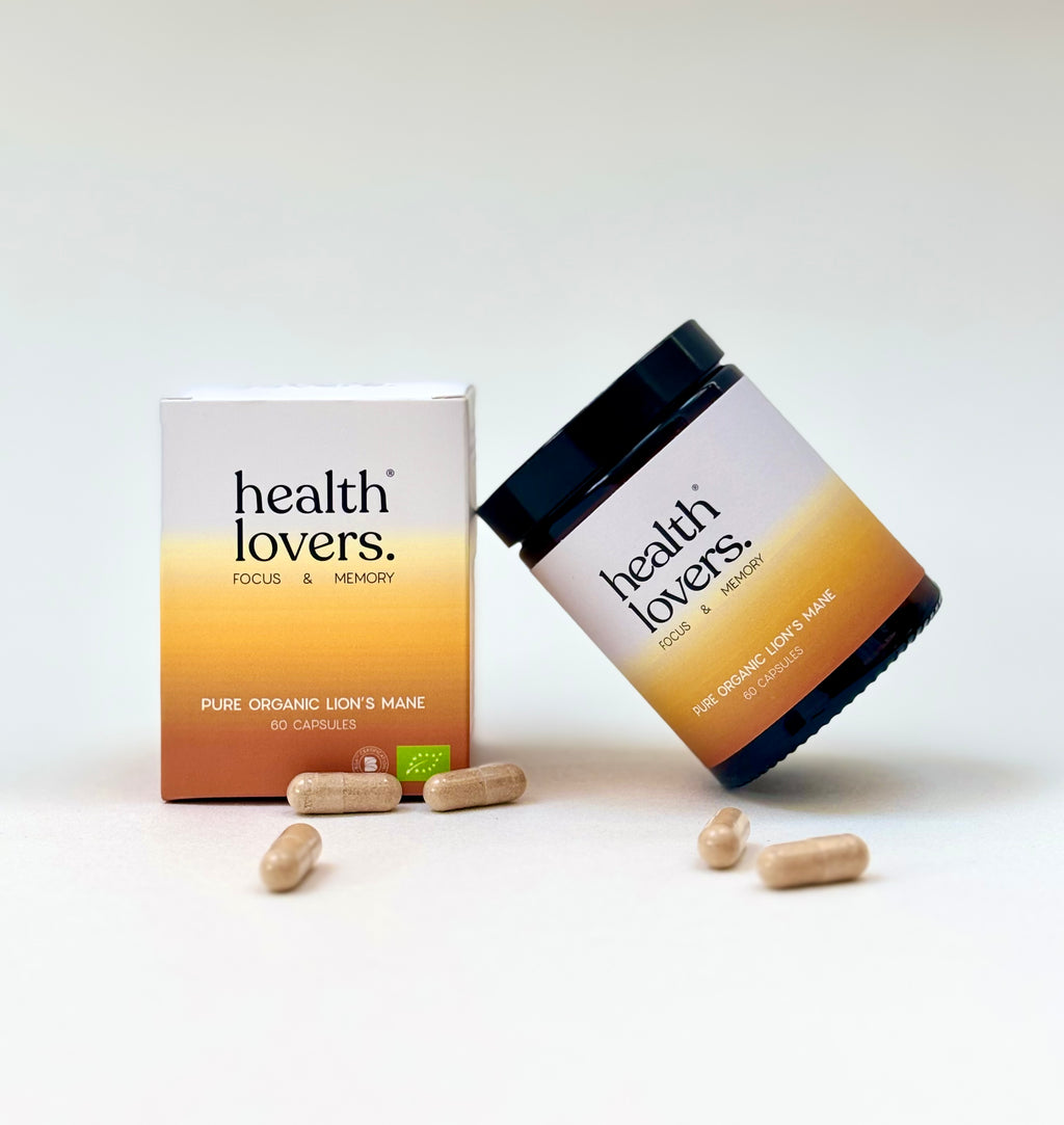 Health Lovers organic lions mane supplement container and capsules on a white background