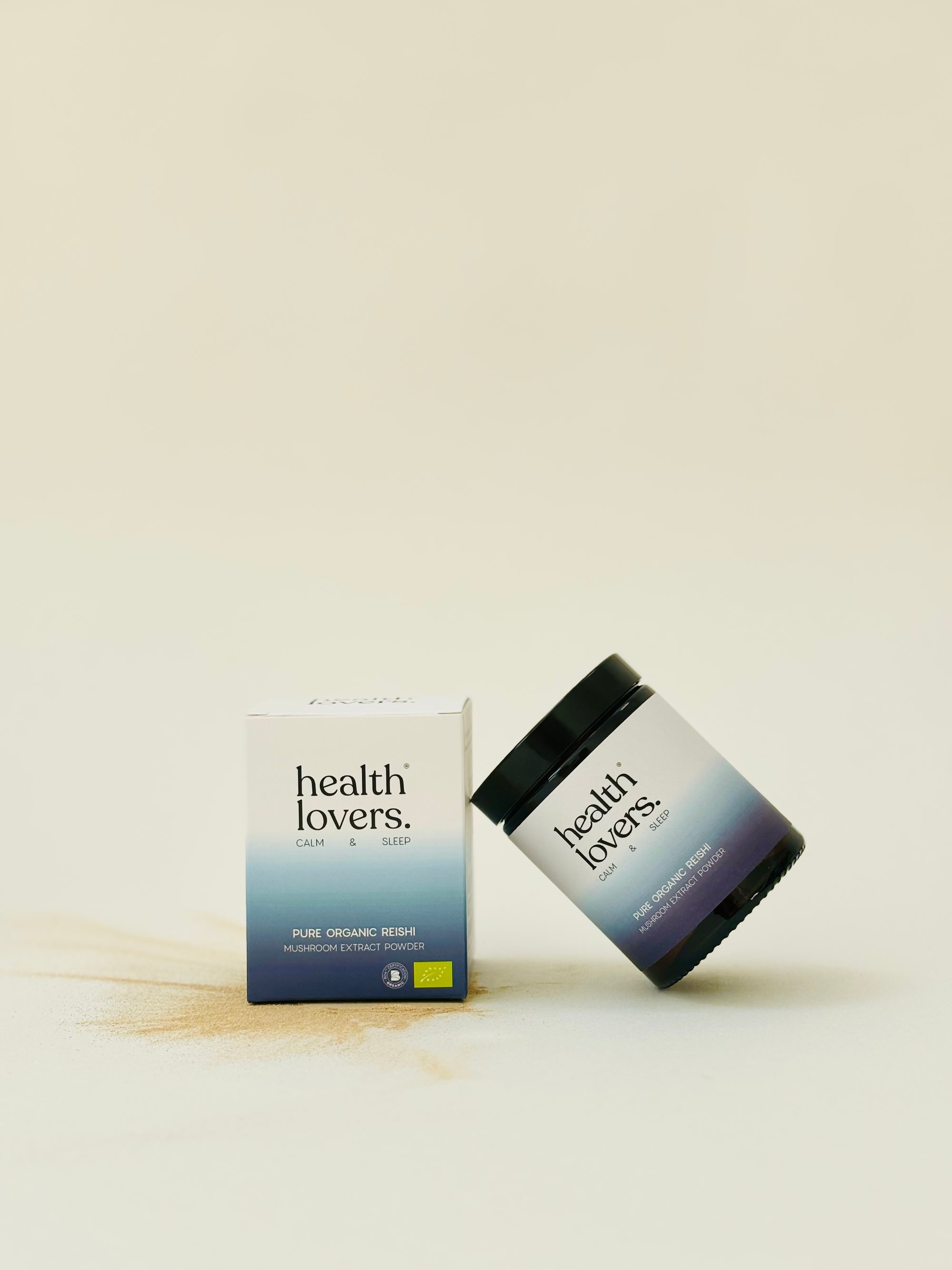 Jar and box of 'health lovers' organic reishi product on a light background