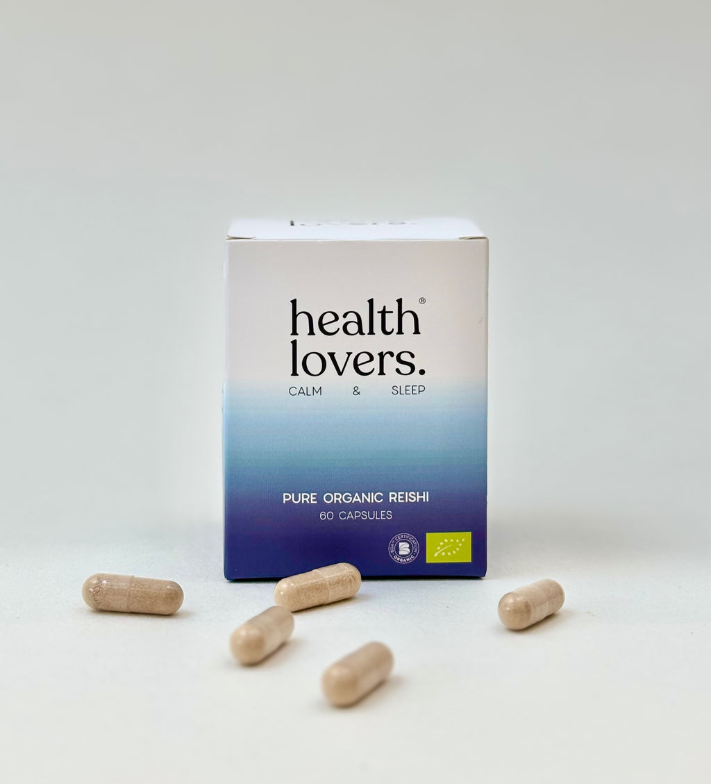 Box of 'health lovers.' Pure Organic Reishi capsules on a white background